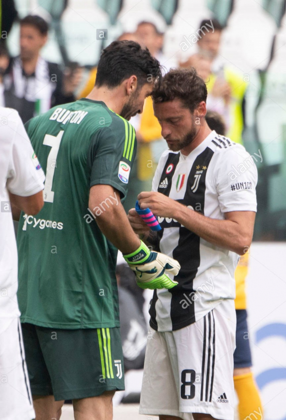 gianluigi-buffon-leave-the-field-for-the-last-time-with-juventus-and-is-celebrated-by-claudio-marchisio-of-juventus-during-the-italian-serie-a-match-between-juventus-2-1-hellas-verona-at-allianz-stadium-on-may-19-2.jpg